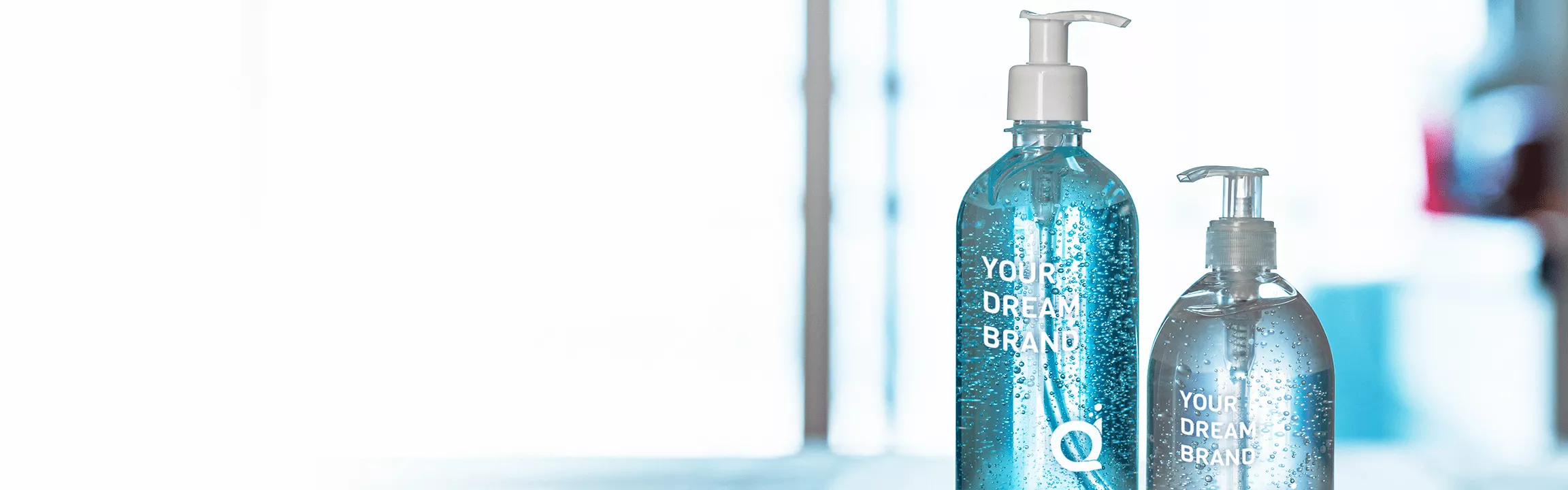 Maklon PKRT Dreamlab – botol cairan pembersih transparan dengan isi berwarna biru